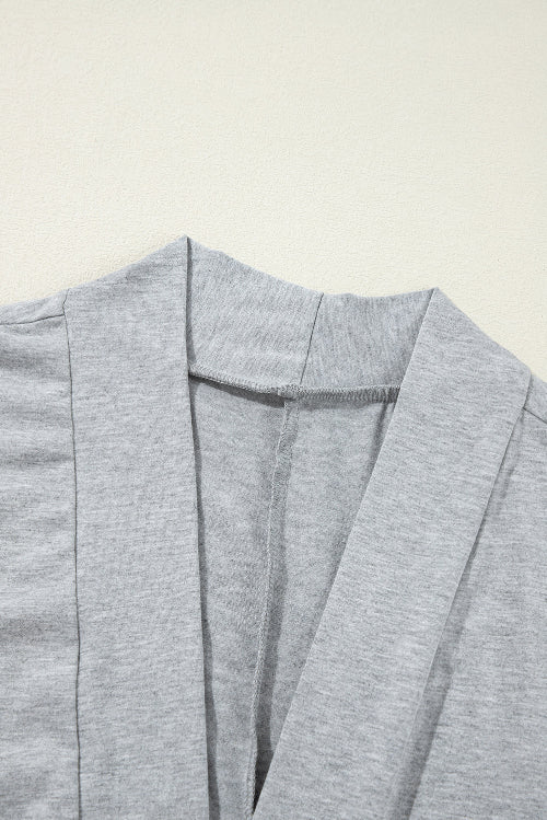 Gray blazer on a light beige background
