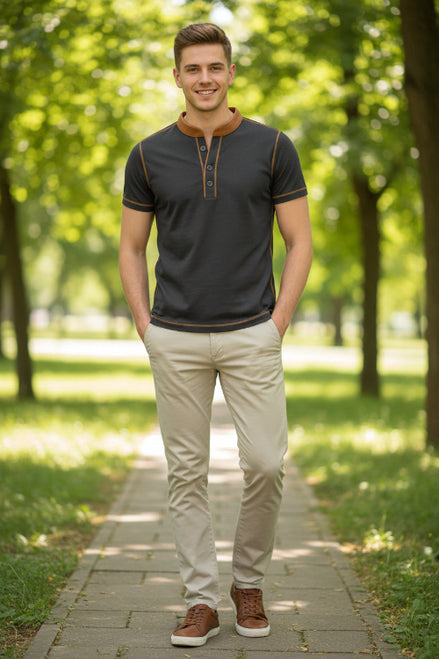 Black polo shirt with brown accents on a white background