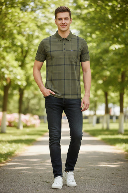 Green plaid polo shirt on a hanger with a white background