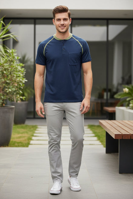 Navy blue short-sleeve shirt with green accents on a white background