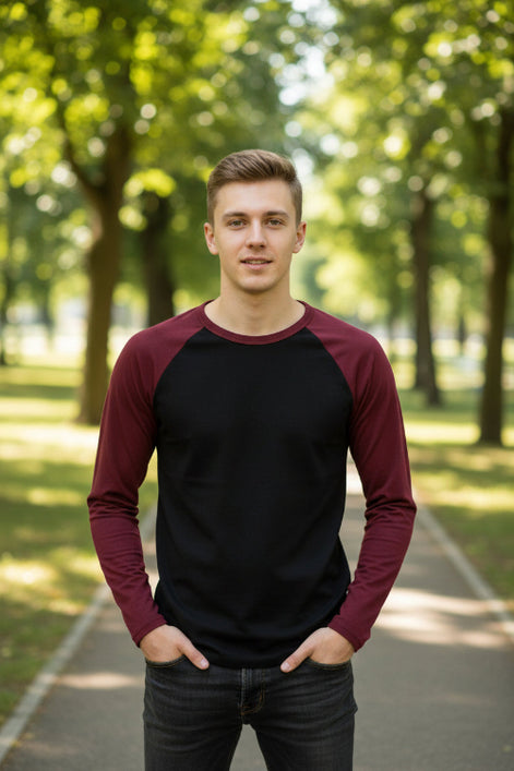 Black long-sleeve shirt with maroon sleeves on a white background