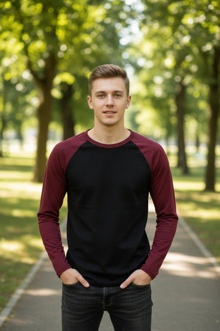 Black long-sleeve shirt with maroon sleeves on a white background
