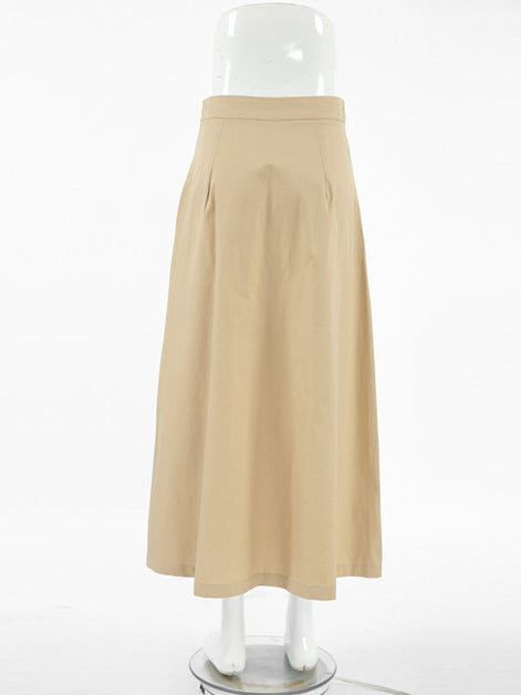 Beige skirt on a mannequin against a white background