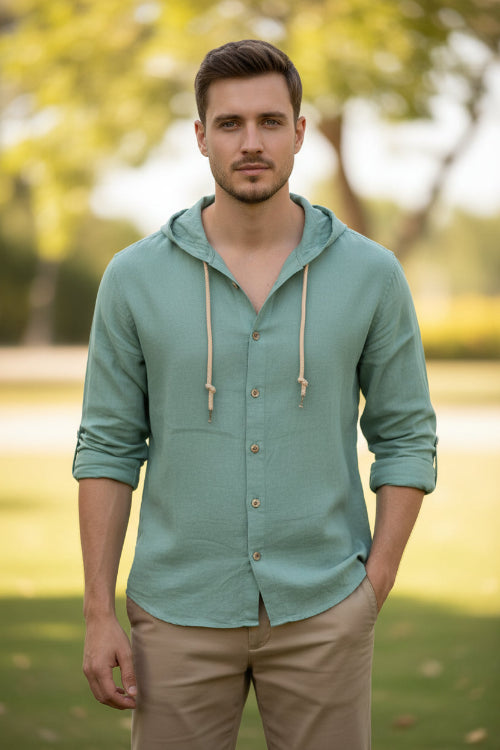 Light blue hooded shirt with buttons on a white background