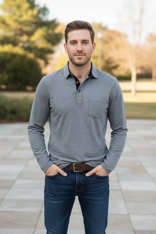 Gray long-sleeve polo shirt worn by a person on a white background