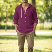 Purple button-up shirt with a hood on a white background