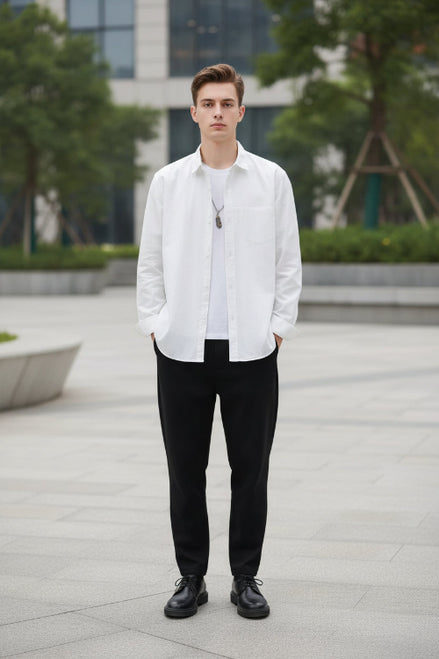 White button-up shirt worn by a person on a gray background