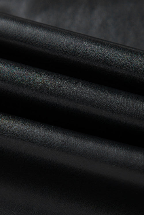 Close-up of black leather texture