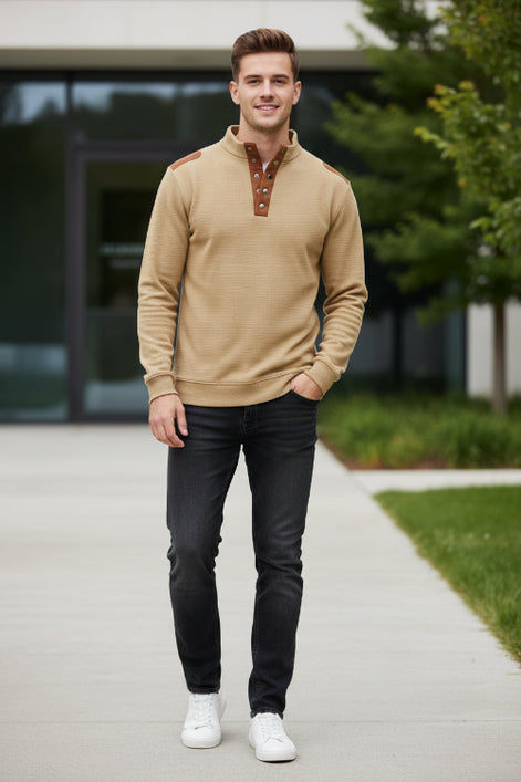 Beige shirt with brown leather accents on a white background