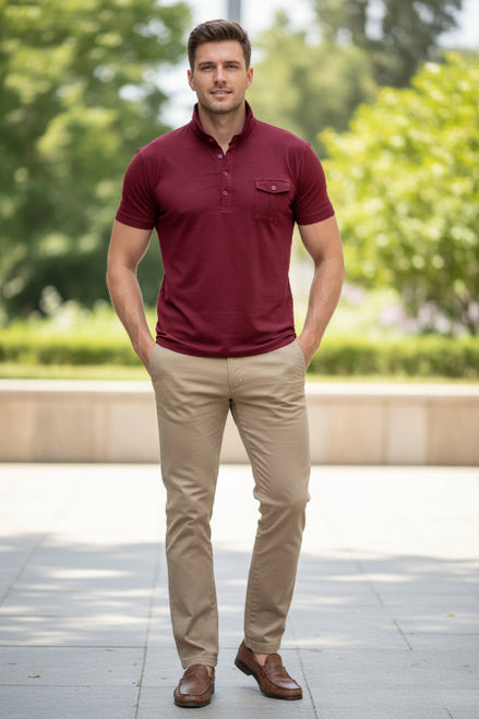 Man wearing a red polo shirt with a white background