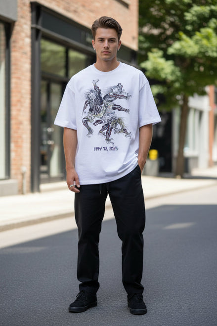 Person wearing a white t-shirt with a graphic design and text on a textured beige background
