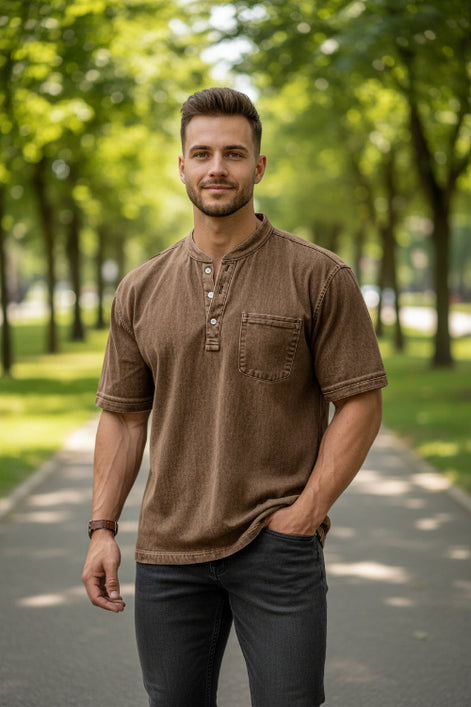 Brown short-sleeve shirt worn by a person on a white background