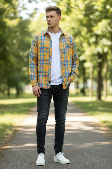 Yellow plaid shirt on a mannequin against a gray background