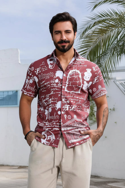 Man wearing a red patterned shirt with a blurred background