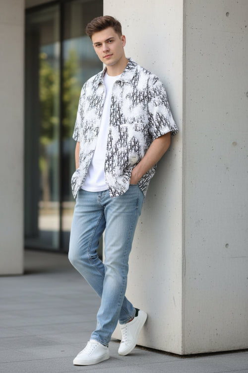 White shirt with black abstract pattern on a white background
