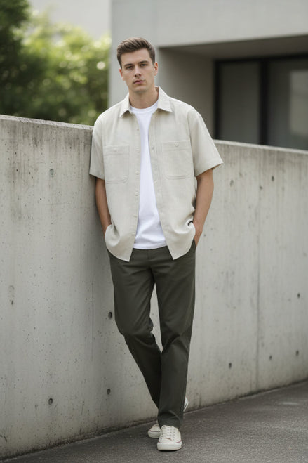 Beige short-sleeve shirt with a collar on a white background