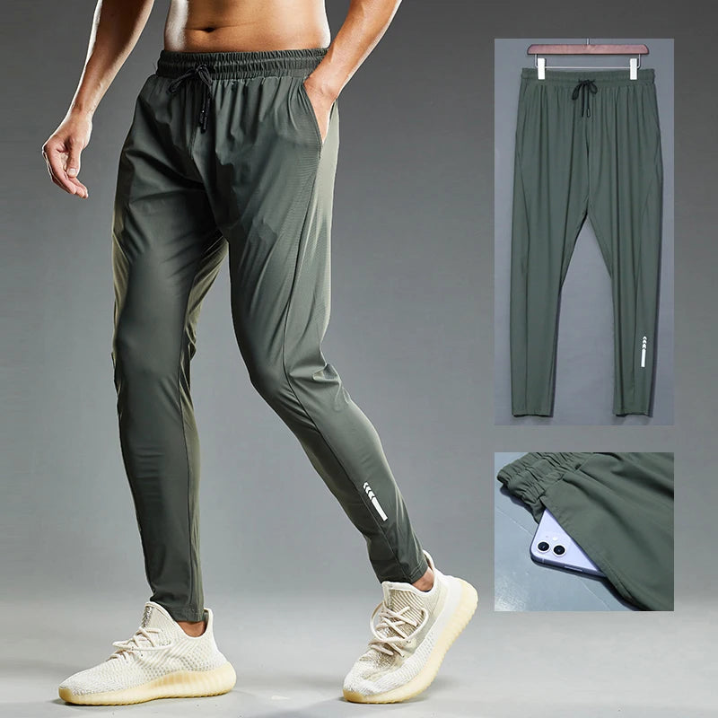 Person wearing green athletic pants with inset images of the pants on a gray background