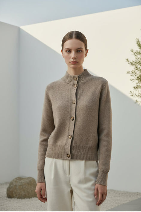 A taupe knit cardigan sweater shown on a white background, with a close-up inset of the front button and ribbed knit detail.