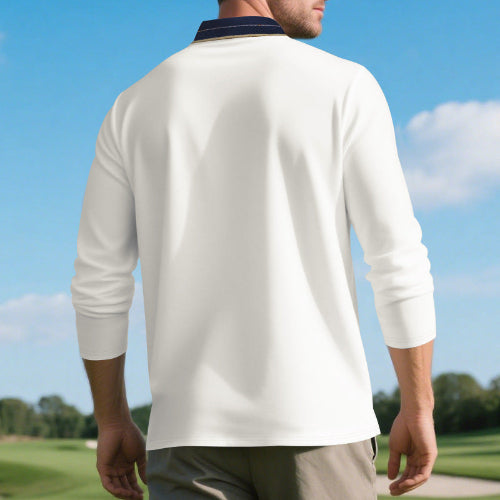 Back view of men's white long sleeve polo shirt with a contrasting navy collar and fine collar stripes, modeled outdoors with sleeves pushed up and khaki trousers
