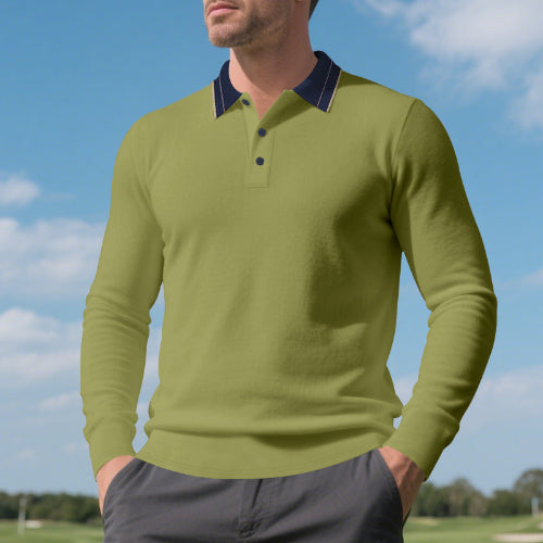 Men's army green long sleeve polo shirt with a contrasting navy collar and three-button placket, modeled outdoors with gray trousers