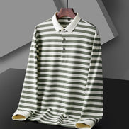 Men's green and white striped long sleeve polo shirt shown from the front with a white collar and three-button placket on a wooden hanger