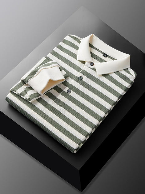 Men's green and white striped long sleeve polo shirt folded to show the white collar, three-button placket, and white cuff