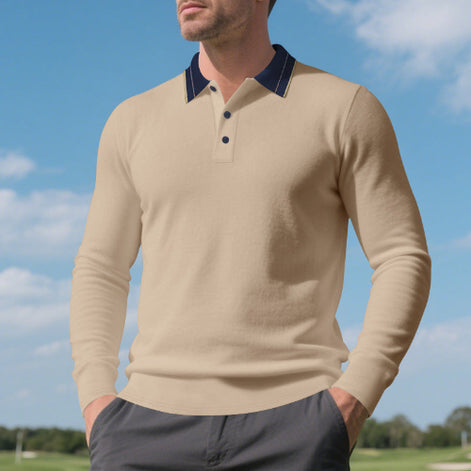 Men's khaki long sleeve polo shirt with a contrasting dark collar and three-button placket, modeled outdoors with gray trousers