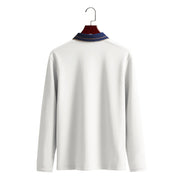 Back view of men's white long sleeve polo shirt with a contrasting navy collar and fine collar stripes on a wooden hanger