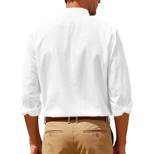 Back view of men's white linen blend stand collar shirt with rolled sleeves, tucked into khaki trousers with a brown belt
