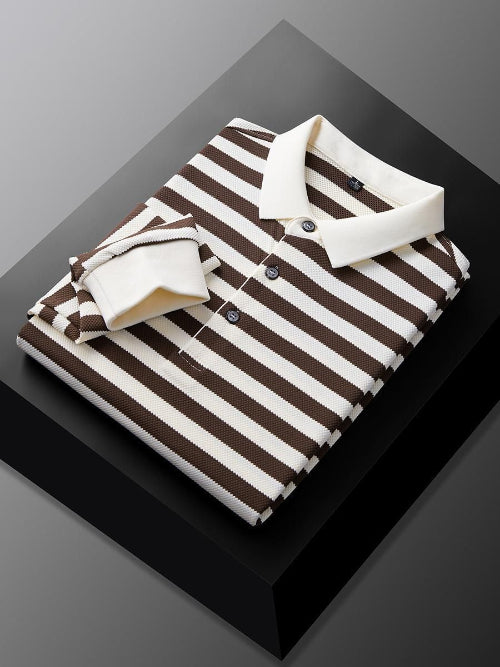 Men's brown and white striped long sleeve polo shirt folded to show the white collar, three-button placket, and white cuff