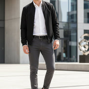 Black leather shoes with white soles on a white background