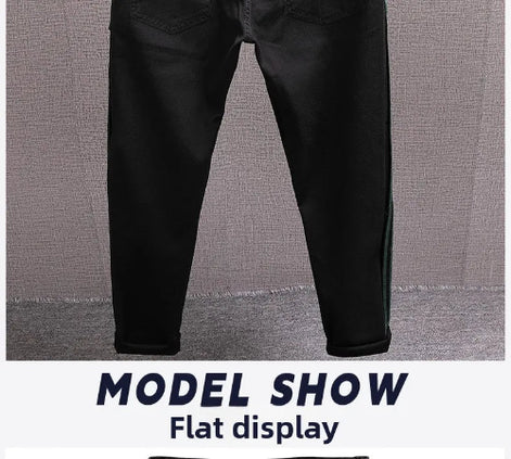 Black slim-fit jeans shown flat against a textured gray background, with a white banner at the bottom reading 'MODEL SHOW Flat display'.