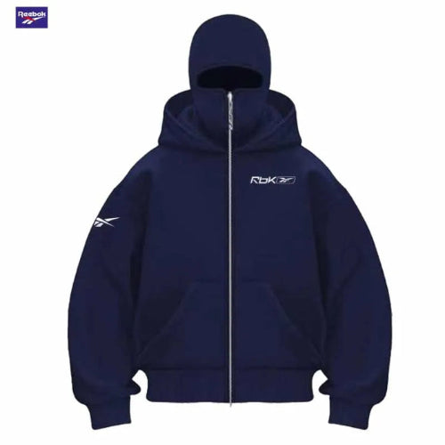 A navy blue Reebok zip-up hoodie with a white logo on the left chest and sleeve, displayed on a clean white background.