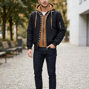 Black jacket with brown interior and plaid lining on a white background