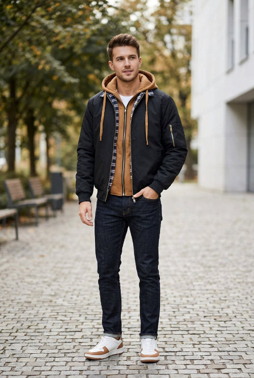Black jacket with brown interior and plaid lining on a white background