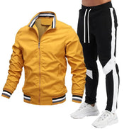 Yellow jacket and black pants with white stripes on a white background