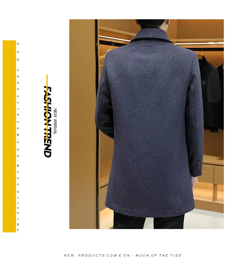 A man viewed from behind wearing a dark slate blue textured overcoat in what appears to be a boutique interior. The image is presented as a styled editorial layout with a yellow vertical bar on the left containing the text 'FASHION TENDENT' and a small caption at the bottom.