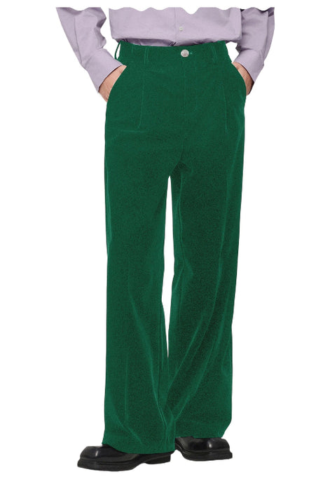 A person wearing high-waisted, wide-leg green corduroy trousers, styled with a light lavender ruffled shirt and black leather shoes, 