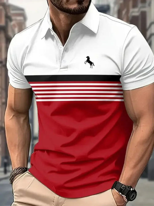 White polo shirt with red and black stripe design worn by a person, with a blurred background.