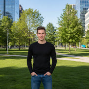 Person wearing blue jeans and brown shoes against a dark gray background