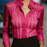 Pink sheer striped shirt worn by a model, shown from the front.