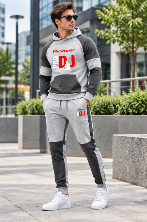 A two-piece athletic loungewear set consisting of a raglan hoodie and matching joggers in heather gray and dark gray. 