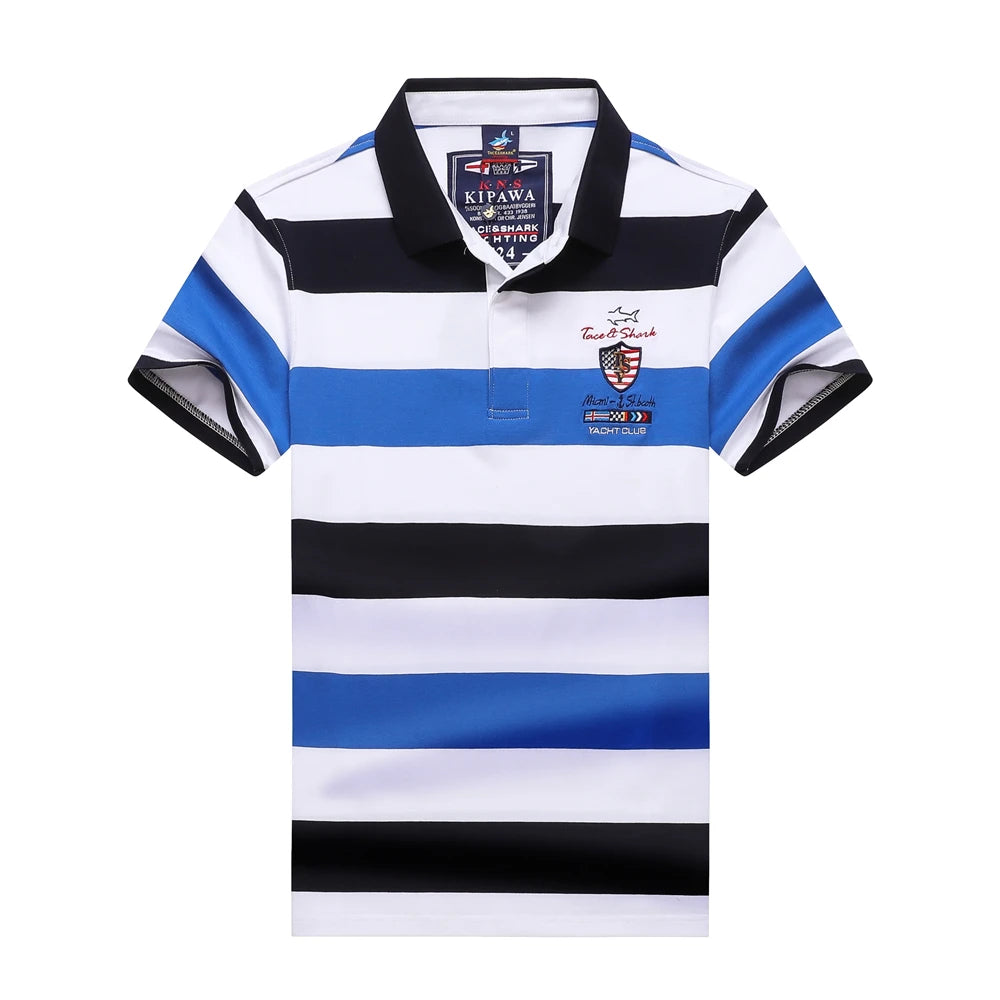 A short-sleeve polo shirt with horizontal stripes in black, white, and blue. It features a black collar, black mesh lining on the sleeves, a small embroidered crest on the left chest, and a brand label on the inner neck.