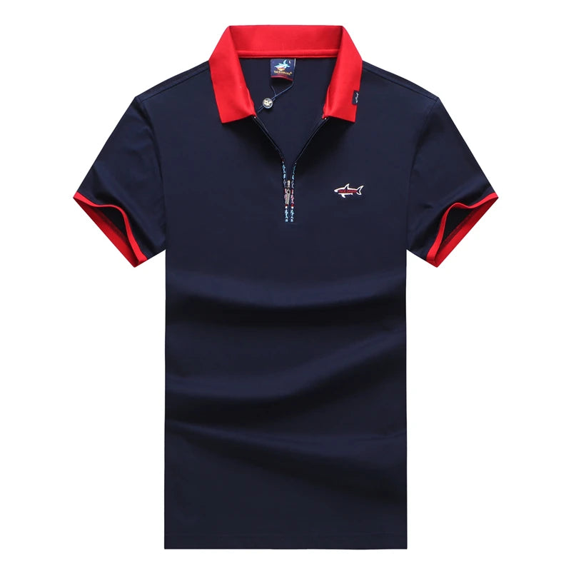 Navy blue polo shirt with red collar and trim on a white background