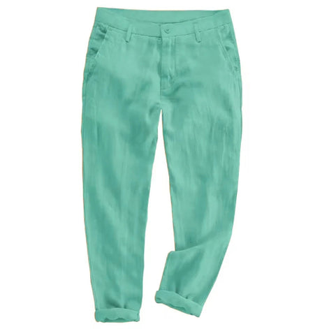 A pair of men's trousers in a light mint green or turquoise color, shown flat against a solid white background.