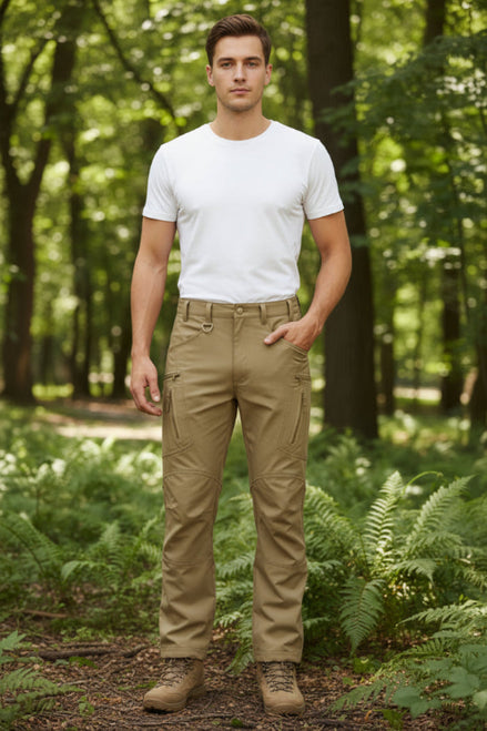 Beige pants worn by a person on a white background with Magcomsen logo.