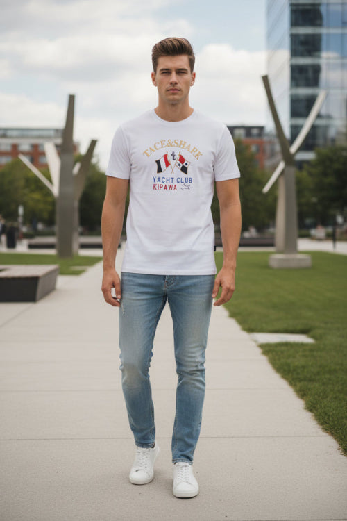 White t-shirt with 'Tace&Shark' branding and graphic design on a white background