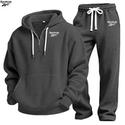 Gray hoodie and pants set with Lacoste logo on a white background