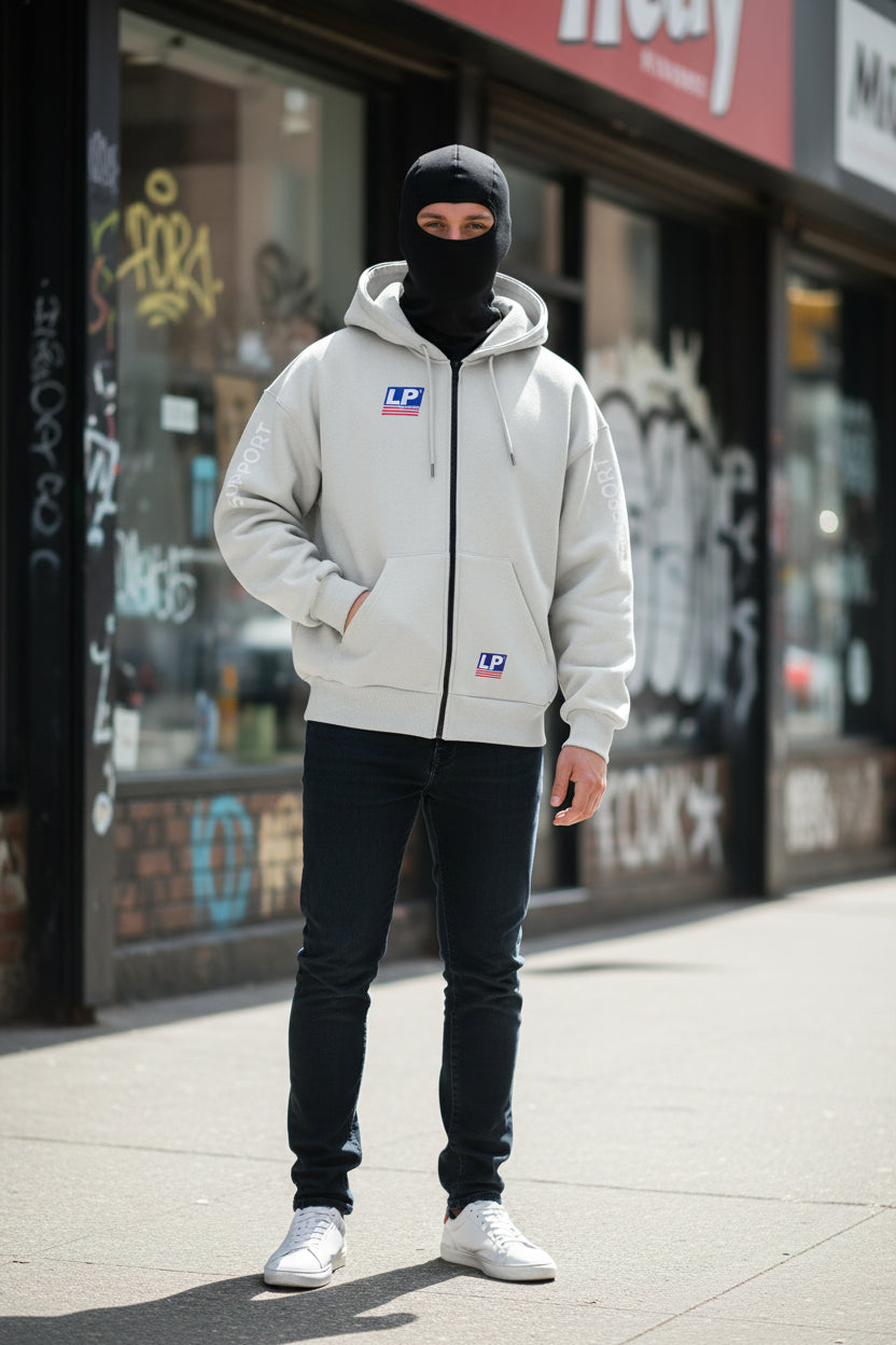 A light gray zip-up hoodie with a black front zipper, black hood lining, and a black balaclava-style hood insert. The hoodie features 'LP' logos on the chest and lower front pocket, with 'SUPPORT' printed vertically on both sleeves.