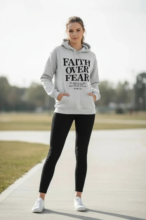 Gray hoodie with 'Faith Over Fear' text on a light background